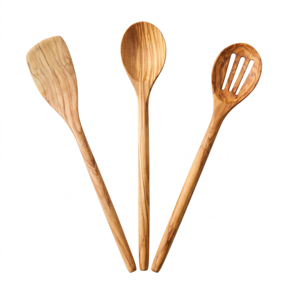 Three-piece wooden utensil set on white background
